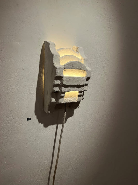 Sun sconce